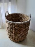 Panier de rangement ovale 40 x 30 x 35 cm en fibres végétales naturelles avec anses tressées